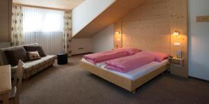 Säng eller sängar i ett rum på Waldgasthaus Lehmen