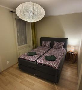 Posteľ alebo postele v izbe v ubytovaní Apartamenty Hetmańska - 24h Shop