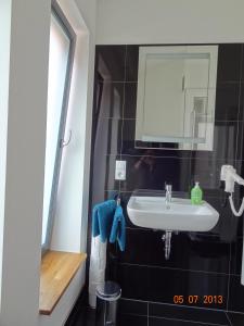 Kúpeľňa v ubytovaní Backbord Und Steuerbord