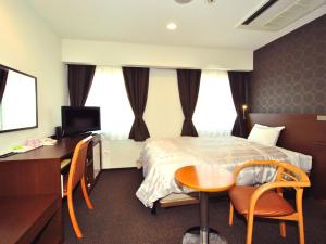 Ένα ή περισσότερα κρεβάτια σε δωμάτιο στο Hotel Mark-1 Abiko
