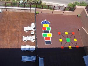 an overhead view of a playground with colorful blocks at Aparthotel El Faro in Cullera
