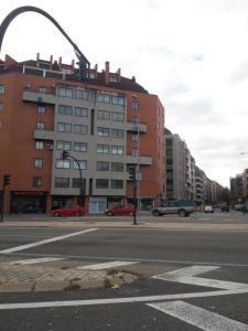 an empty city street with a building and a street light at Mirador del Duero in Zamora
