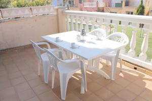 Balkón nebo terasa v ubytování casa cerca playa con piscina comunitaria ref 252