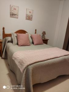 A bed or beds in a room at Edificio SATI 1 A