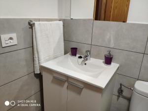 Koupelna v ubytování Edificio SATI 1 A + 27 fotografií