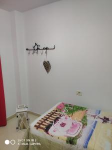 Postel nebo postele na pokoji v ubytování Edificio SATI 1 A
