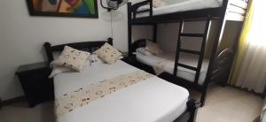 Voodi või voodid majutusasutuse Hotel Colonial toas