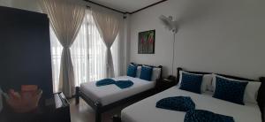 Voodi või voodid majutusasutuse Hotel Colonial toas