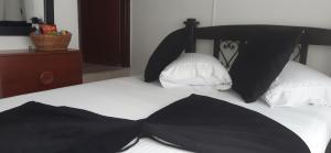 Voodi või voodid majutusasutuse Hotel Colonial toas