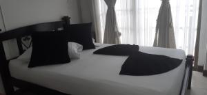 Voodi või voodid majutusasutuse Hotel Colonial toas