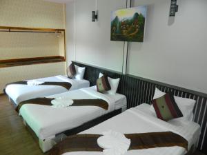 Krevet ili kreveti u jedinici u okviru objekta Pai Iyara Resort