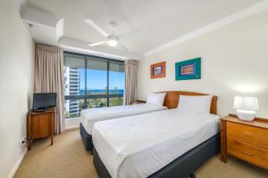 Katil atau katil-katil dalam bilik di Victoria Square Apartments +105 gambar