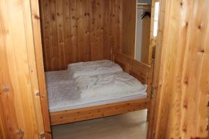 Säng eller sängar i ett rum på Kvitfjell Alpinhytter Kvitfjellvegen 492