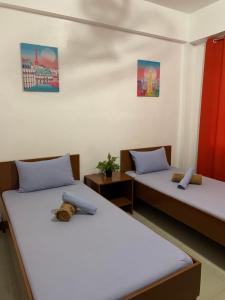 Postel nebo postele na pokoji v ubytování Brielles Travellers Inn