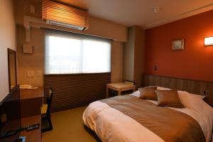 Hotel Imari Aioibashi Bettei客房内的一张或多张床位