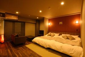 Hotel Imari Aioibashi Bettei客房内的一张或多张床位