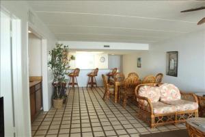 een woonkamer met stoelen en een tafel en een bank bij Saida IV Condos S4801 in South Padre Island