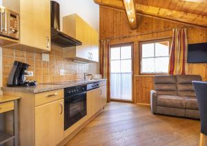 A kitchen or kitchenette at Appartement Oberreiter