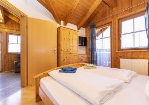 A bed or beds in a room at Appartement Oberreiter