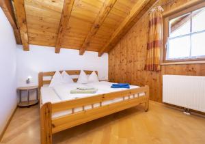 A bed or beds in a room at Appartement Oberreiter