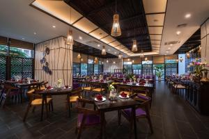 A restaurant or other place to eat at PentStudio West Lake Hanoi