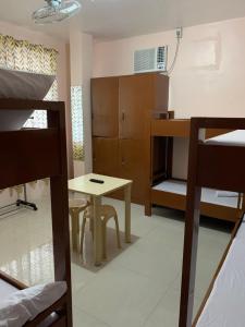 Postel nebo postele na pokoji v ubytování Brielles Travellers Inn