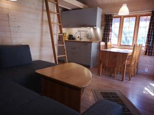 A kitchen or kitchenette at Trollveggen Camping