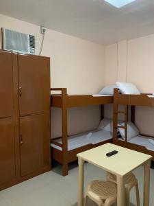Postel nebo postele na pokoji v ubytování Brielles Travellers Inn