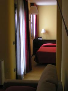Postel nebo postele na pokoji v ubytování Albergo Verdi
