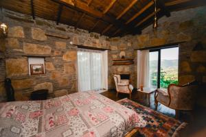 A bed or beds in a room at Kirkinca Hotel