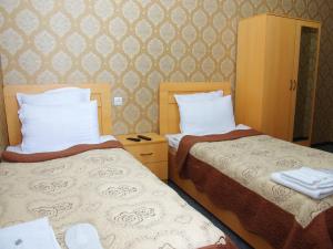 Voodi või voodid majutusasutuse Hotel Shalimar toas