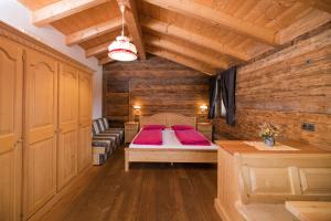 Postelja oz. postelje v sobi nastanitve Glinzhof Mountain Natur Resort Agriturismo