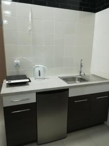 Kuchyňa alebo kuchynka v ubytovaní Buko apartamenty + 5 fotografií