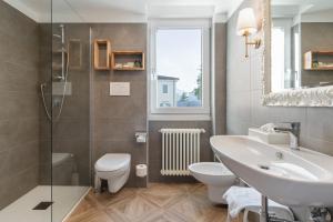 Koupelna v ubytování Hotel Leon d'Oro