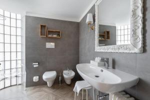 Koupelna v ubytování Hotel Leon d'Oro