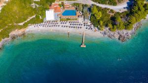 an aerial view of a house on a island in the water at Adrina Beach Hotel in Panormos Skopelos