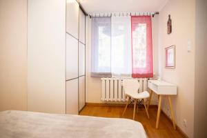 En eller flere senge i et værelse på Apartament Bieszczadzkie Anioły