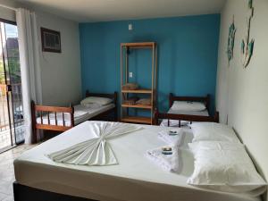 Postel nebo postele na pokoji v ubytování Pousada Mar e Moto