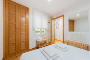 Katil atau katil-katil dalam bilik di Acogedor apartamento - 1D 1B - Sol