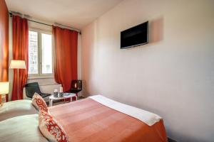 TV a/nebo společenská místnost v ubytování Hotel Boston