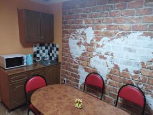O bucătărie sau chicinetă la Butlerov Hostel