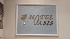 Certifikát, hodnocení, plakát nebo jiný dokument vystavený v ubytování Oasis Hotel