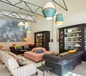 a living room with two couches and a couch at Trafalgar Polo Club in El Palmar