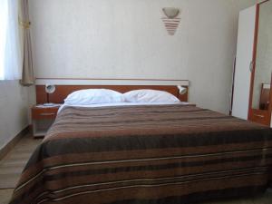Postel nebo postele na pokoji v ubytování Apartment Stjepan - panoramic view