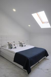 Katil atau katil-katil dalam bilik di Patio di Fiori