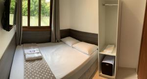 Ein Bett oder Betten in einem Zimmer der Unterkunft Canto Da Mole