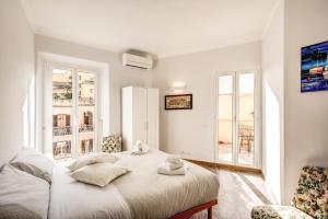 Posteľ alebo postele v izbe v ubytovaní Cavour Attic with terrace