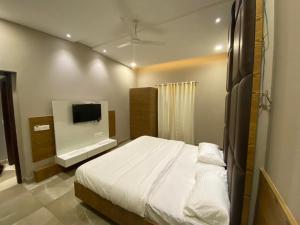 Hotel The Retro Regency客房内的一张或多张床位