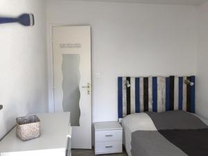 Giường trong phòng chung tại Réf 504, Seignosse océan, appartement proche de la plage et du centre, 4 personnes