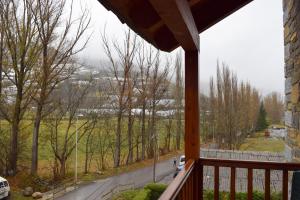 a balcony with a view of a road at Duplex con vistas en Benasque in Benasque